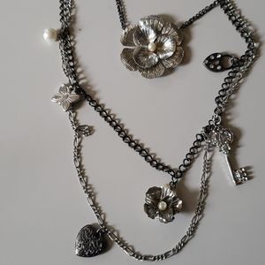 Multi strand silver tones necklace